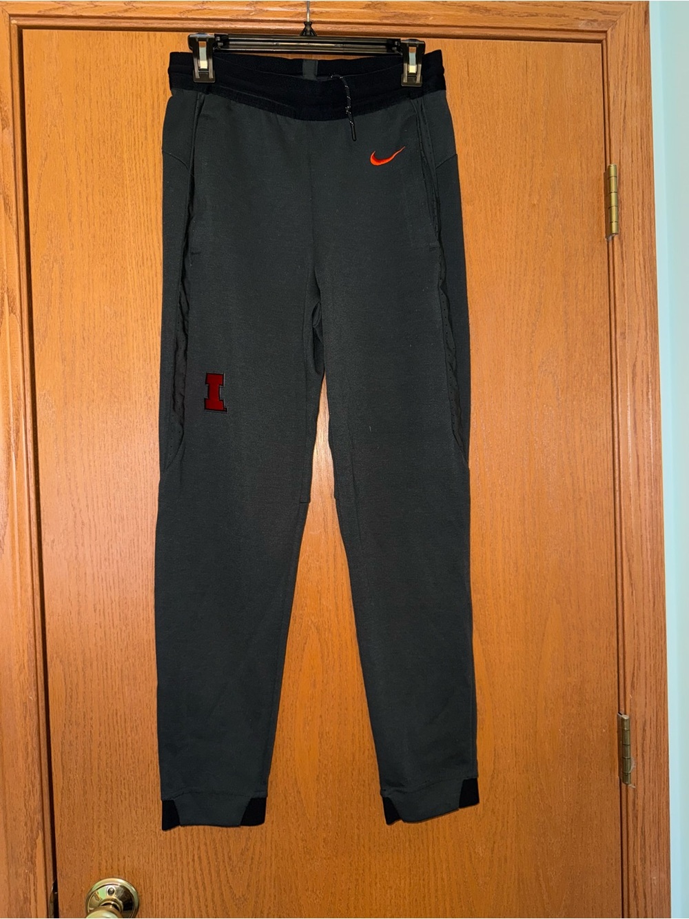 Nike Black Track Jogger Pants with Orange Swoosh
